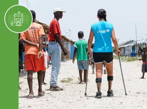 Section D Thumbnail: UNICEF staff with a disability in a camp